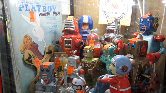 A whole cabinet dedicated to vintage Playboys and robots in Snooper's Paradise.