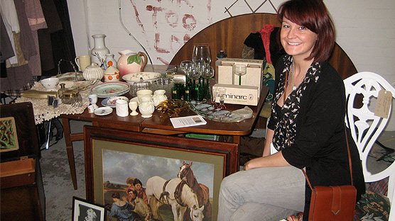 A lovely seller of fine bric-a-brac at Hackney Flea Market in March 2010.