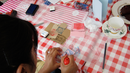 Hearts and cassettes are printed onto luggage tags & envelopes.