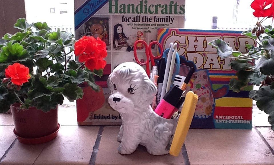 Poodle Pup taking care of my face stationery items