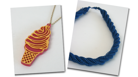 Pink ice cream sundae necklace and blue telephone cord style necklace. Pink ice cream sundae necklace and blue telephone cord style necklace.